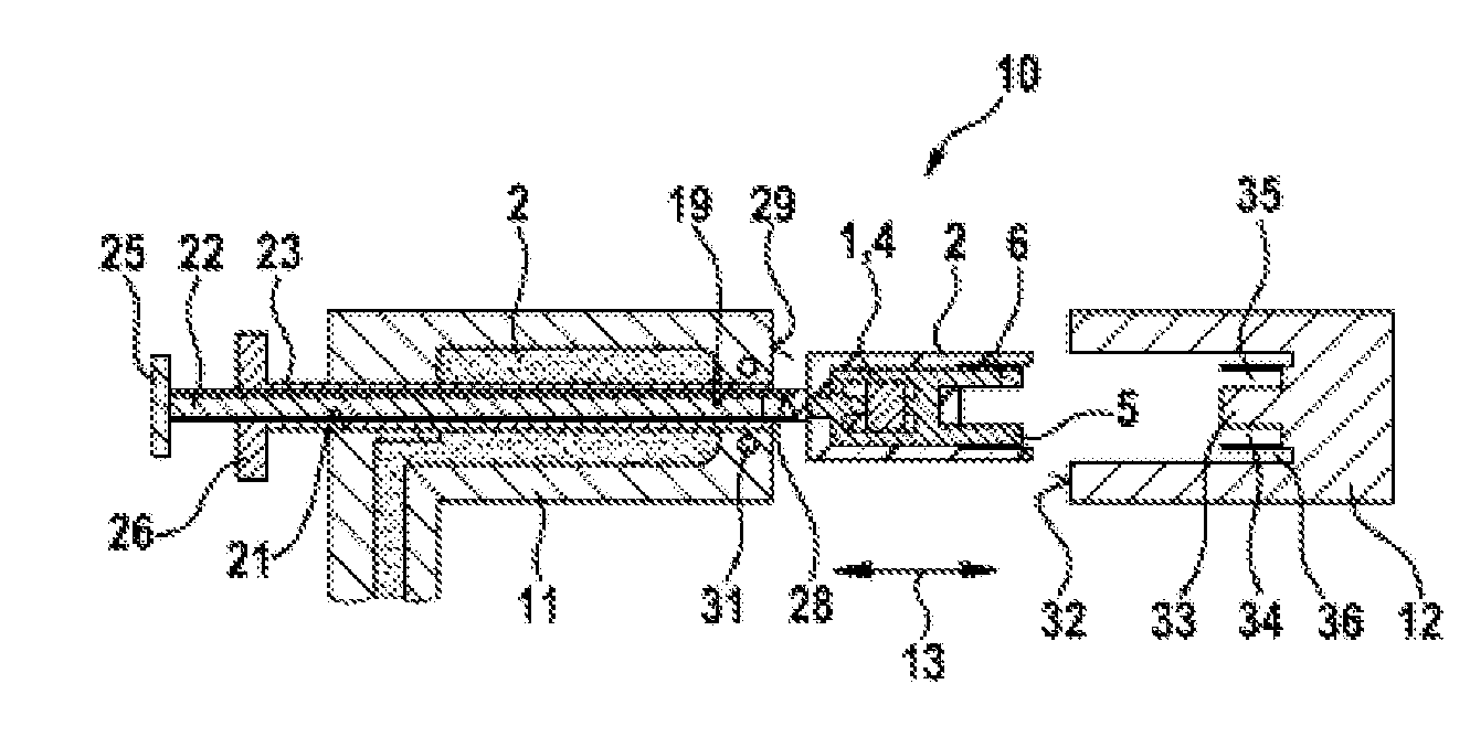 Device for encapsulating a component with plastics material