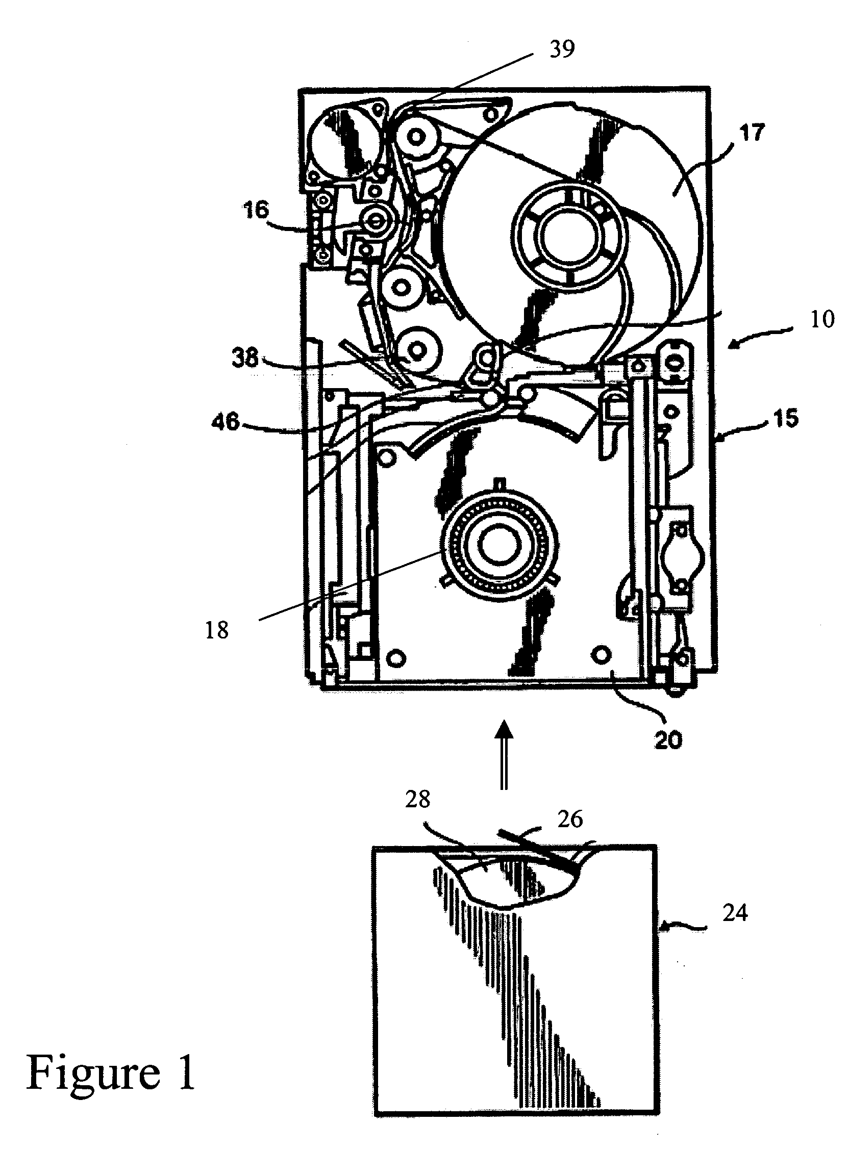 Media cartridge having reel suspension system and method of manufacture