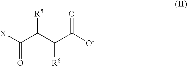 Oil-soluble imine-acid reaction products as asphaltene dispersants in crude oil