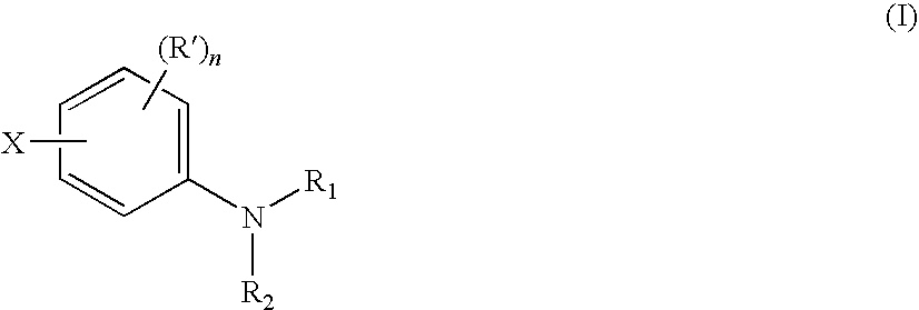 Aniline Compounds as Ashless TBN Sources and Lubricating Oil Compositions Containing Same