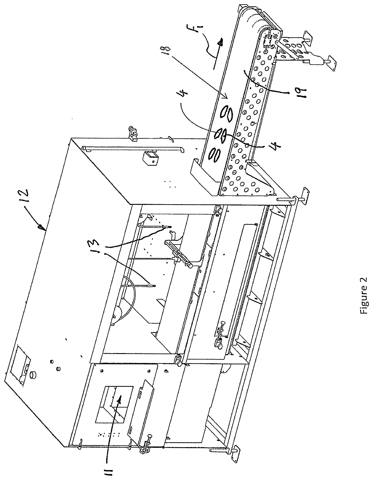 Automated machine for unloading and transferring cut and trimmed poultry meat pieces