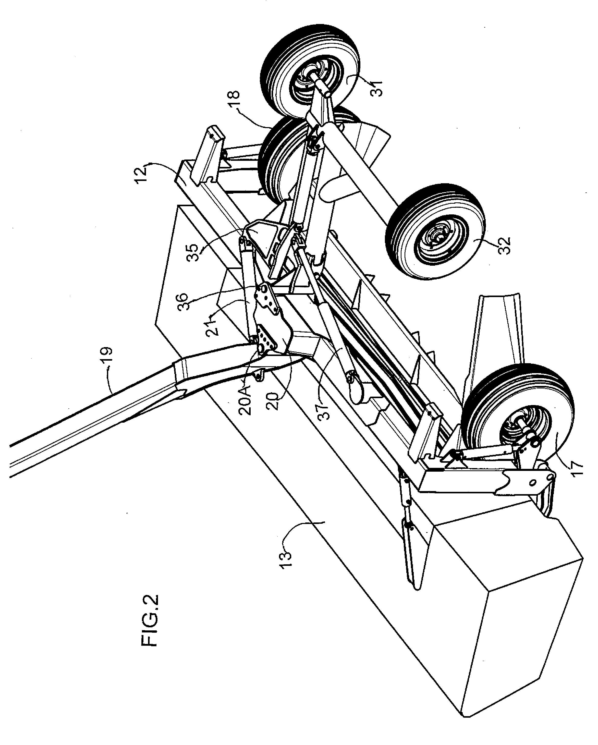 Pull-type crop harvesting machine transport system actuated at a predetermined angle of the hitch