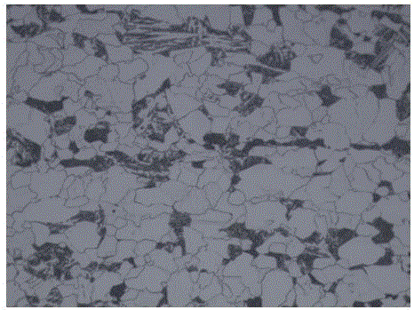 Yield 345 MPa grade fire-resistant steel plate and production method thereof