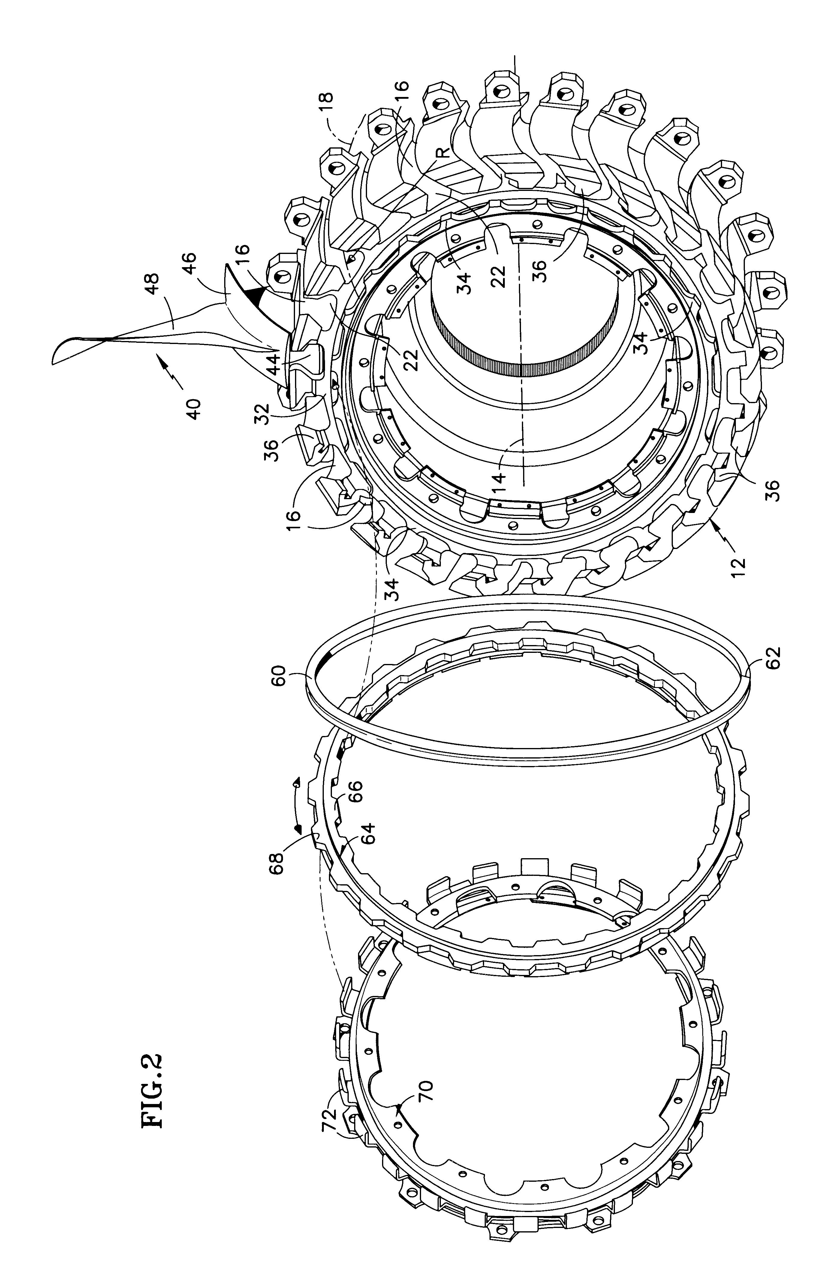 Chamfered attachment for a bladed rotor