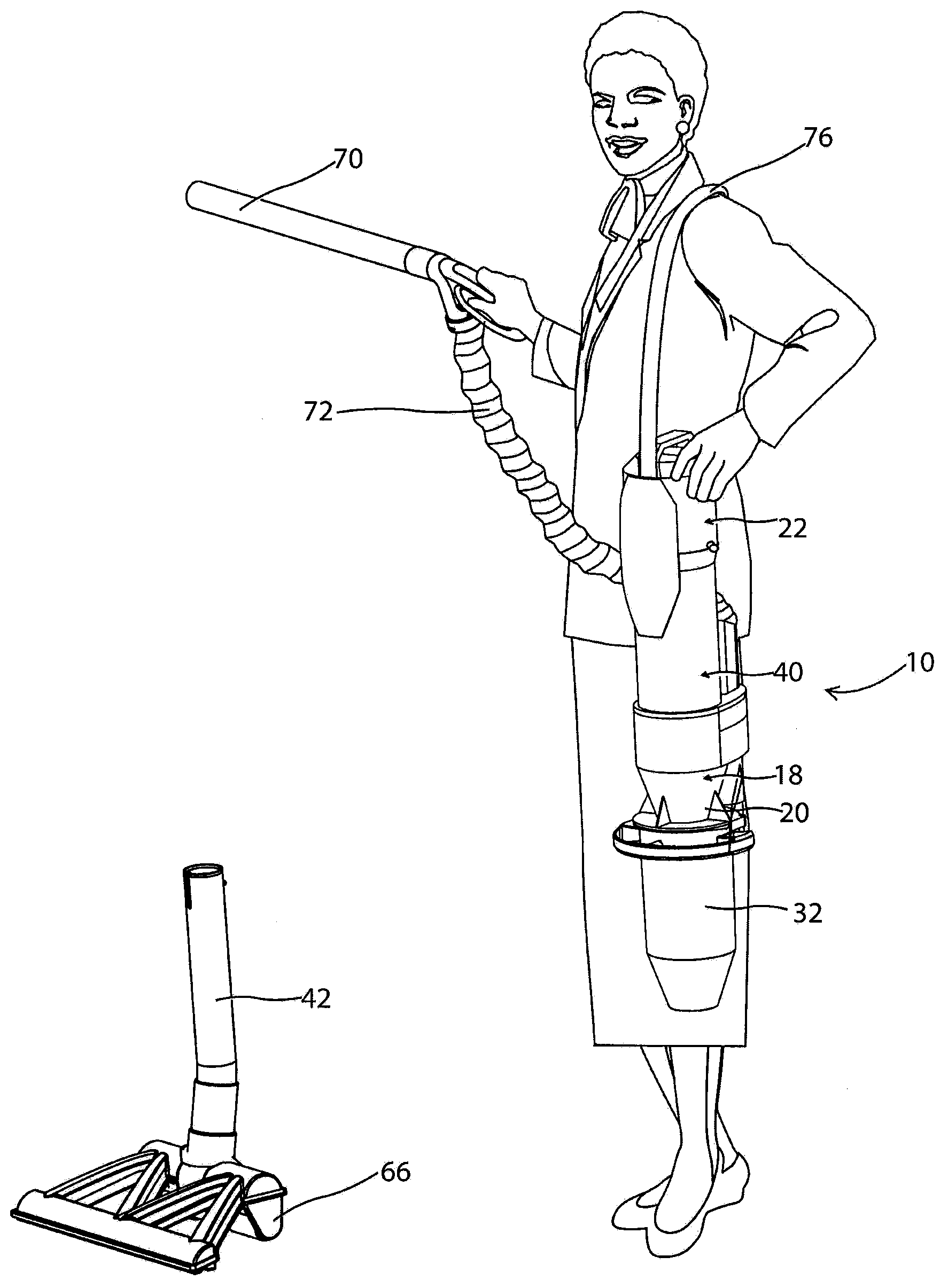 Surface cleaning apparatus with shoulder strap reel