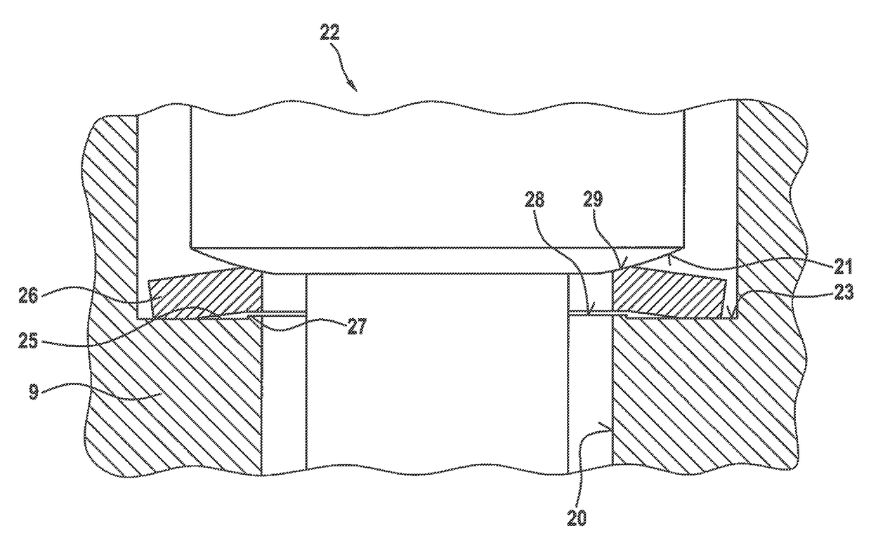 Decoupling element for a fuel injection device