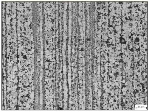 High-die-welded low-temperature container steel plate with medium thickness and high toughness and production method thereof