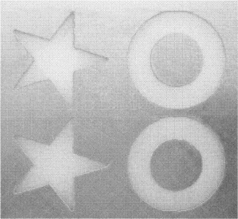 Copper-clad laminate-based method for micro-removing copper film from selected area by assistance of laser