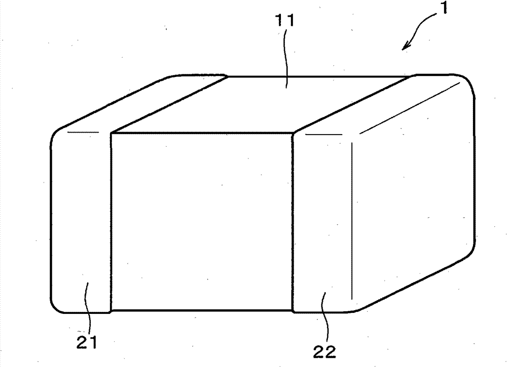 Open magnetic circuit stacked coil component and process for producing the open magnetic circuit stacked coil component