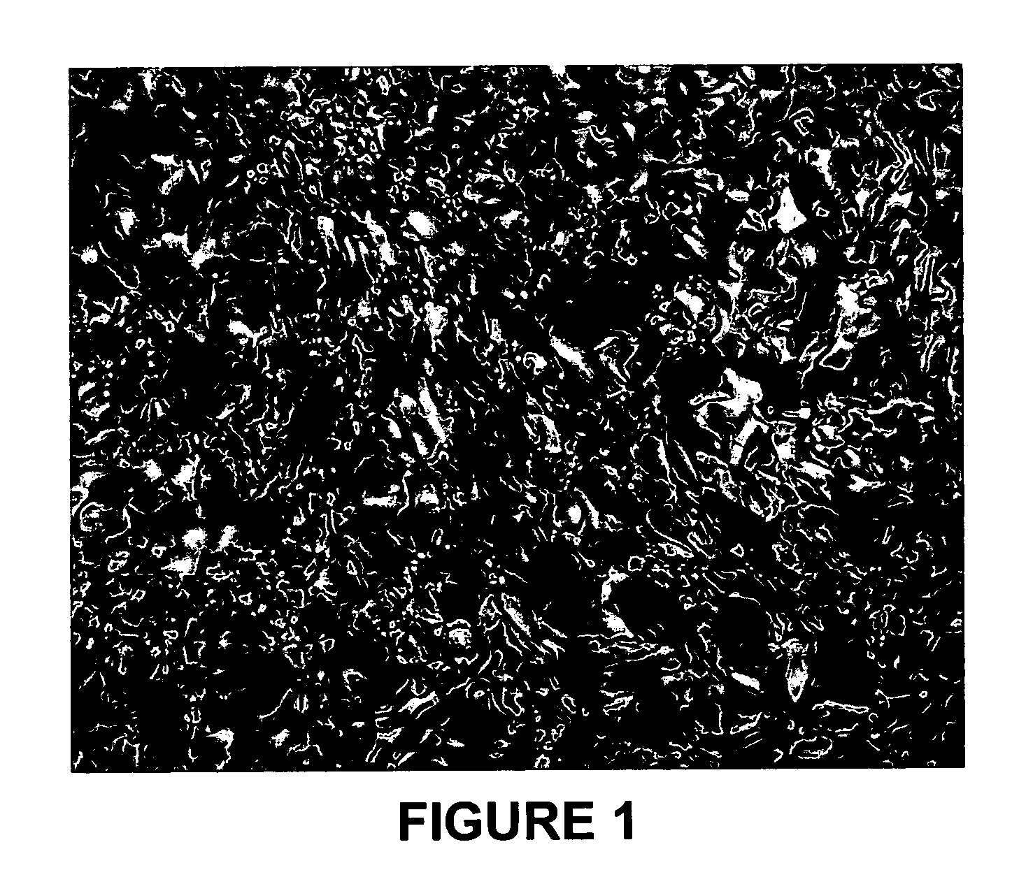 Blending of resid feedstocks to produce a coke that is easier to remove from a coker drum