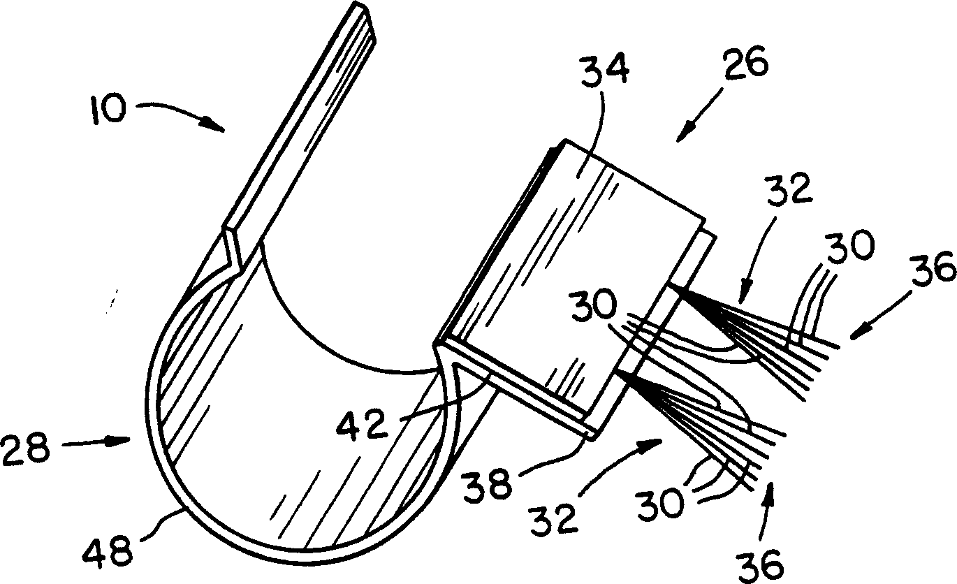 Grounding brush for mitigating electrical current on motor shafts