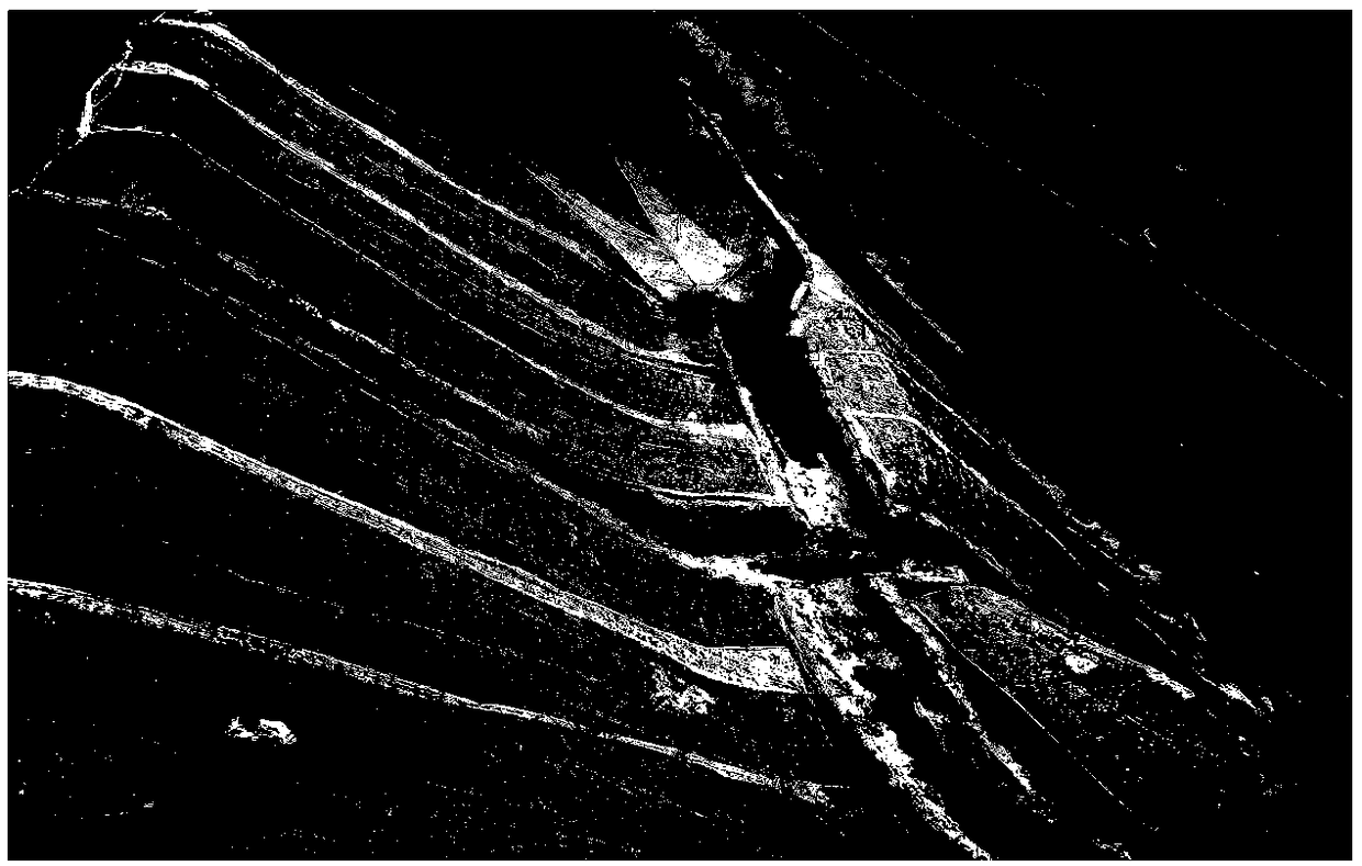 A cement-modified soil-reinforced geogrid-reinforced soil structure and its construction method