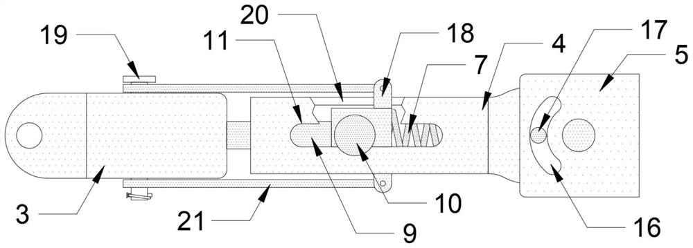 A round bale baler hooked traction device