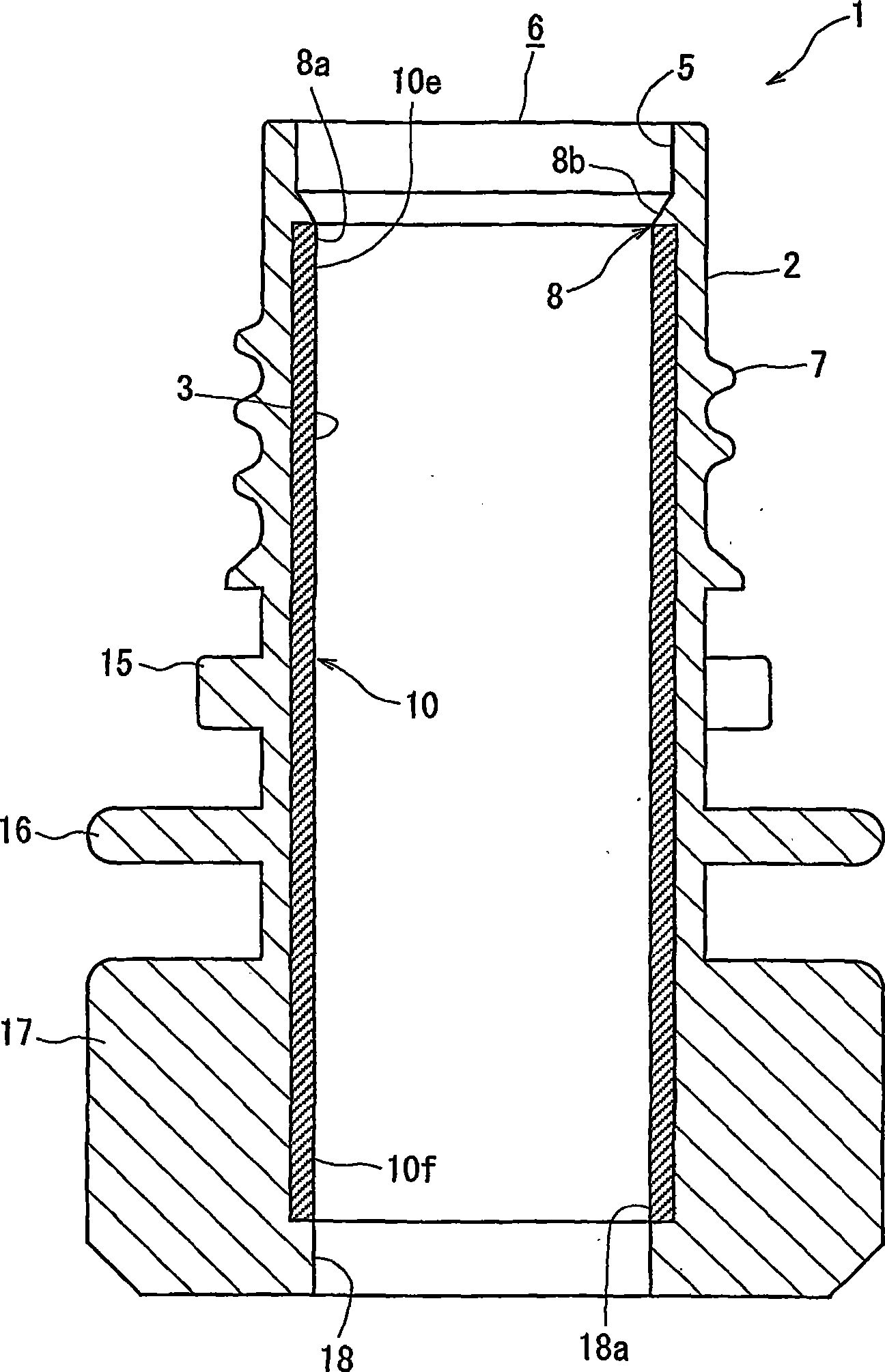 Composite spout, and injection molding device for molding the same