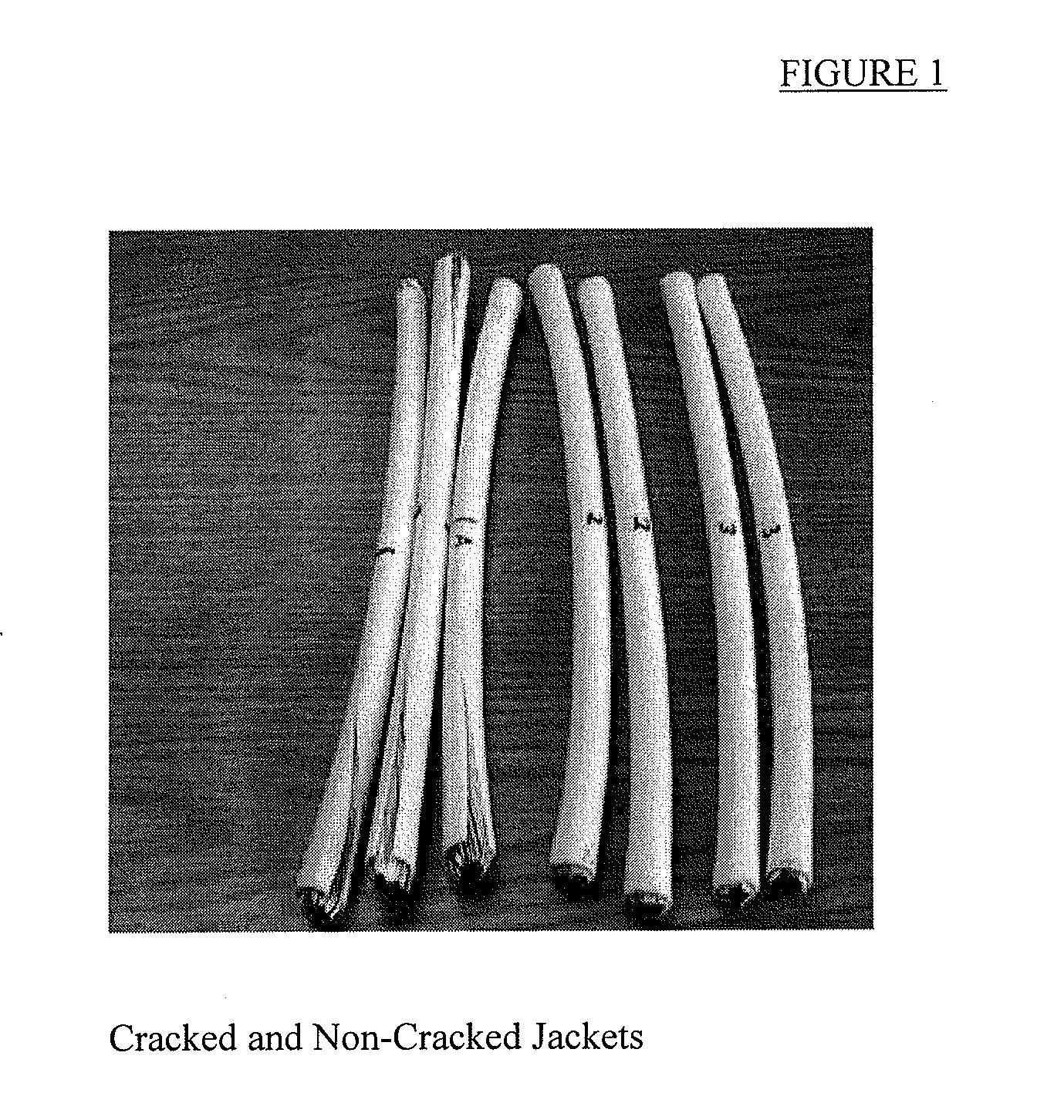 Crack-Resistant, Flame Retardant, Halogen-Free, Cable Assembly and Coating Composition