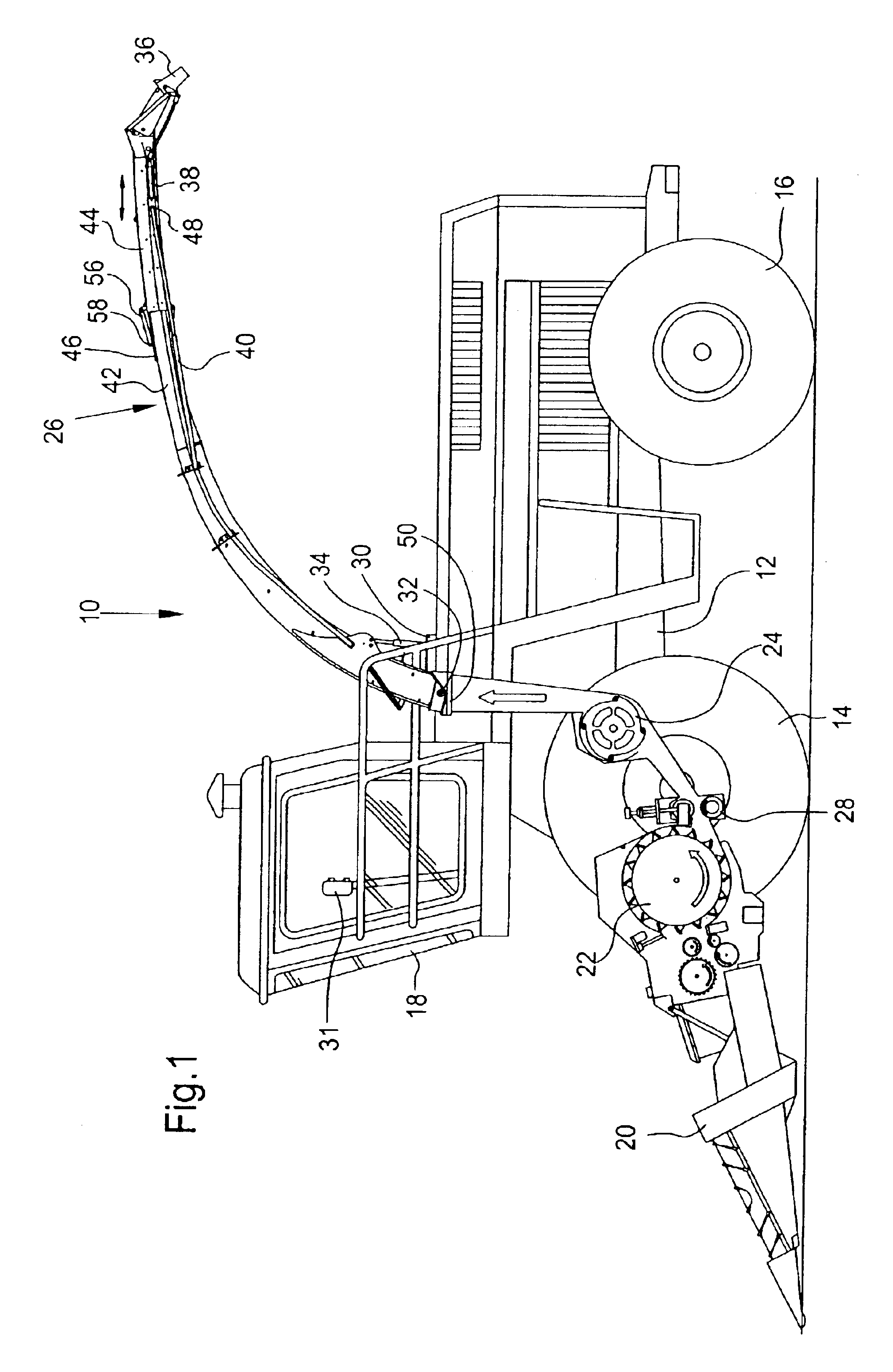 Crop discharge spout arrangement of an agricultural harvesting machine