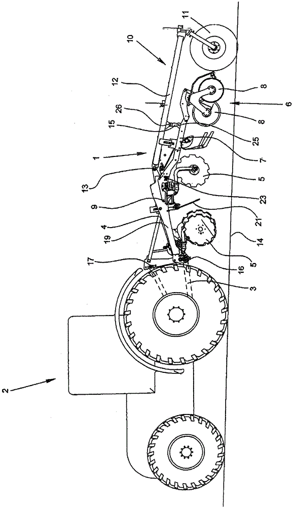 Soil cultivation implement for attachment to a towing vehicle