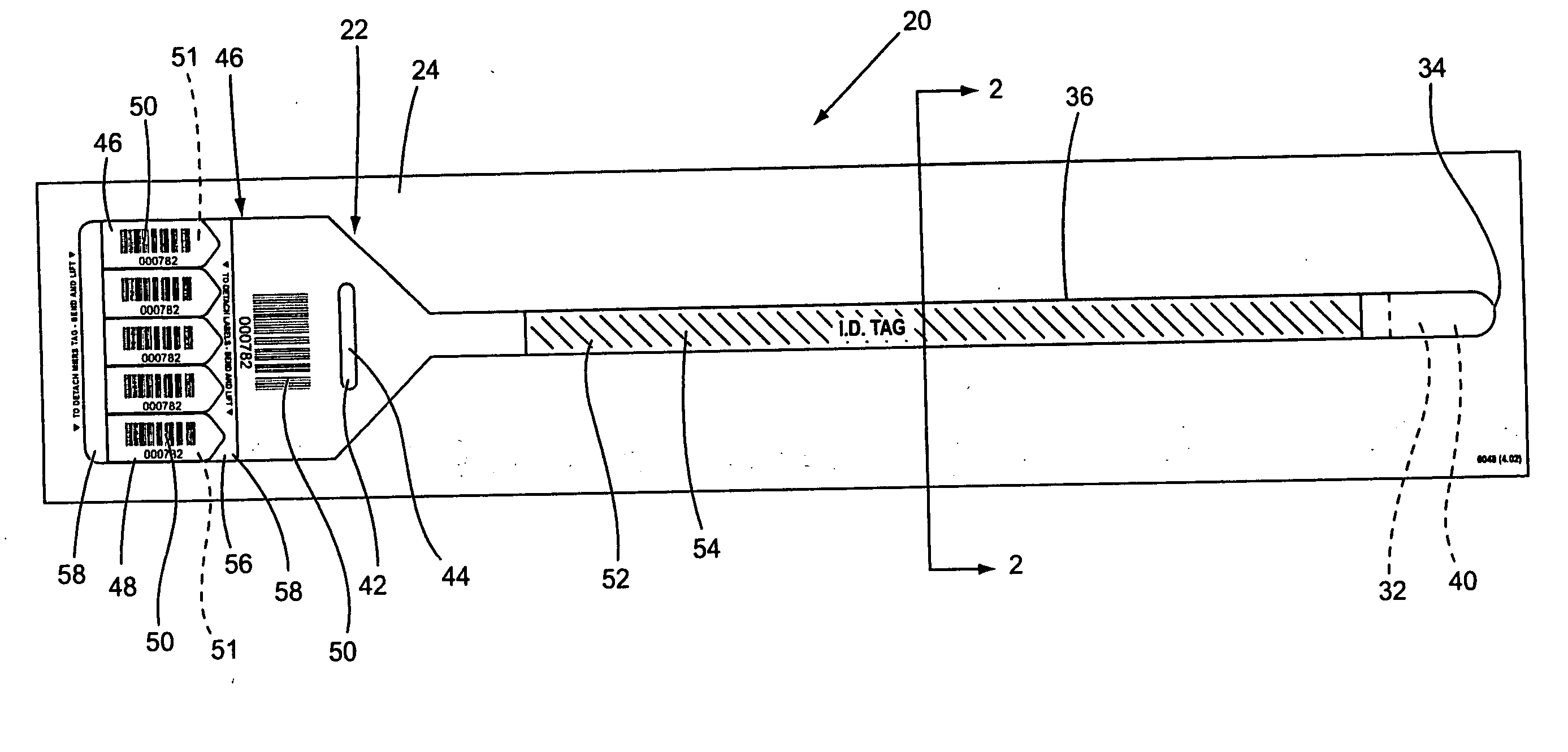 Wristband label assembly with outboard cinch slot