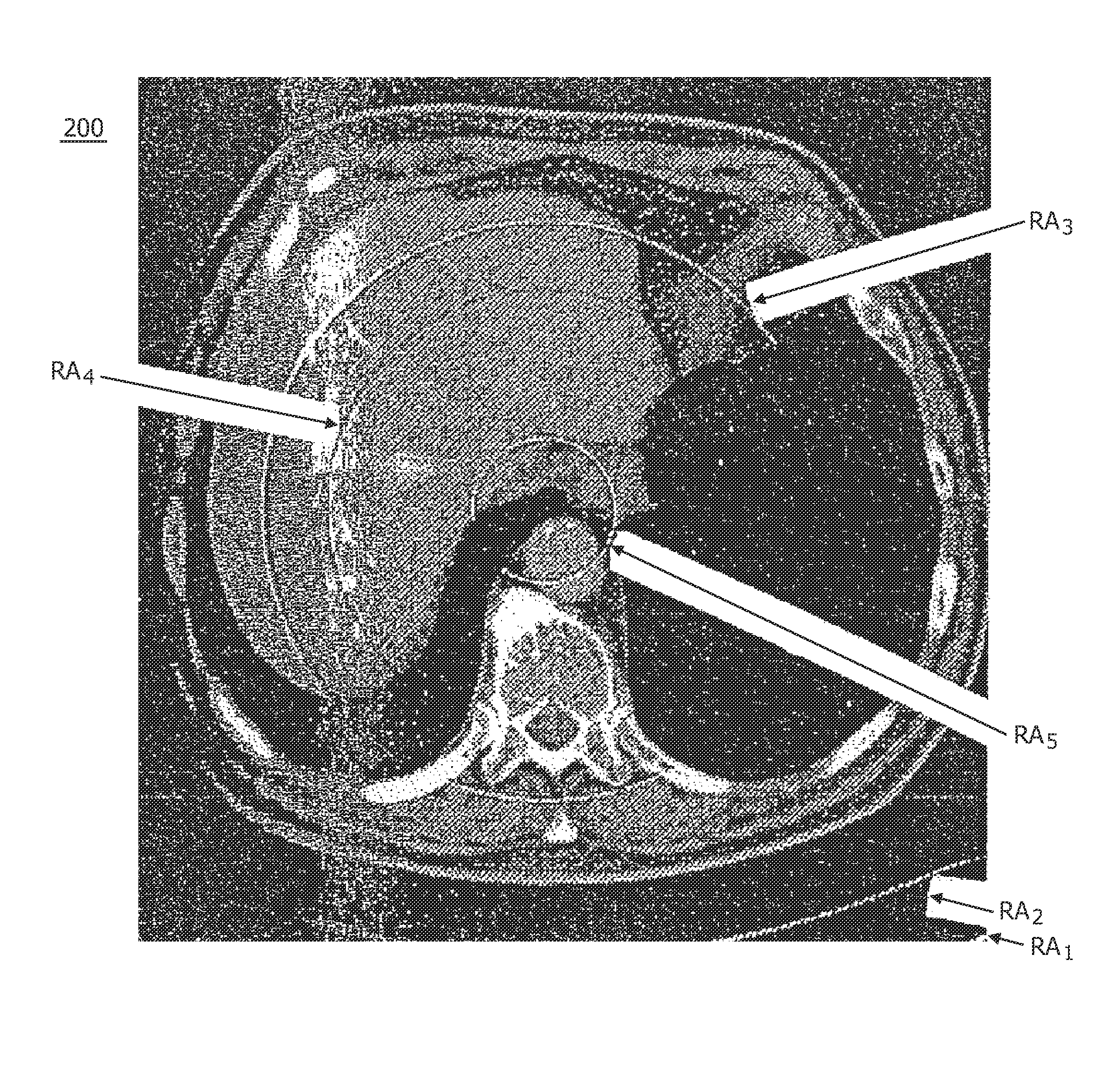 Calibration method for ring artifact correction in non-ideal isocentric 3D rotational x-ray scanner systems using a calibration phantom based rotation center finding algorithm