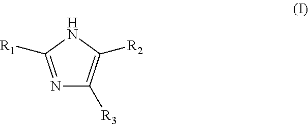 Method of electroplating photoresist defined features from copper electroplating baths containing reaction products of imidazole compounds, bisepoxides and halobenzyl compounds