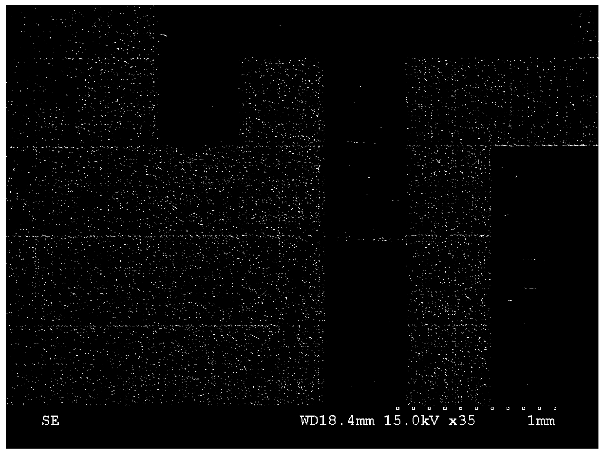 Method for preparing mark stamp based on femtosecond laser ablation composite induction