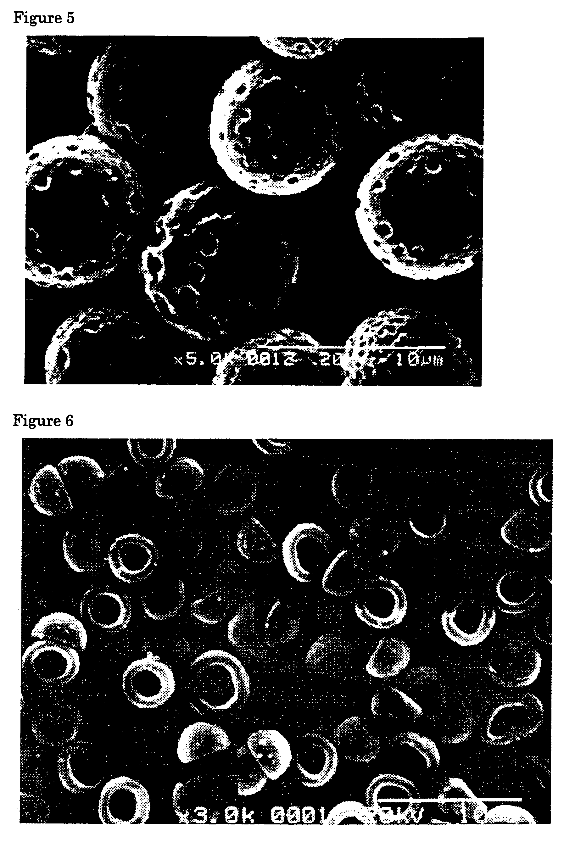 Flat particles and process for production thereof