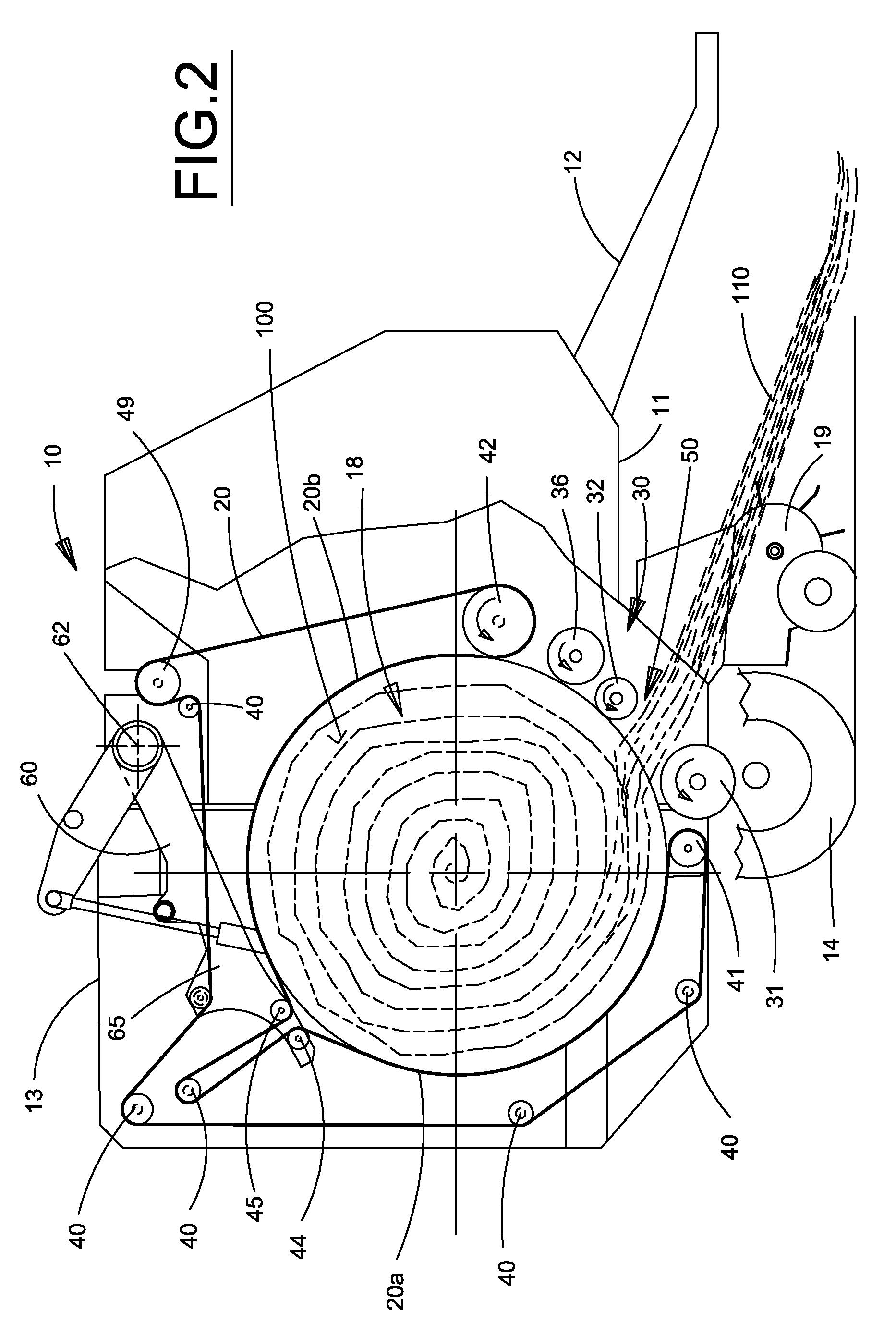 Belt routing in a round baler