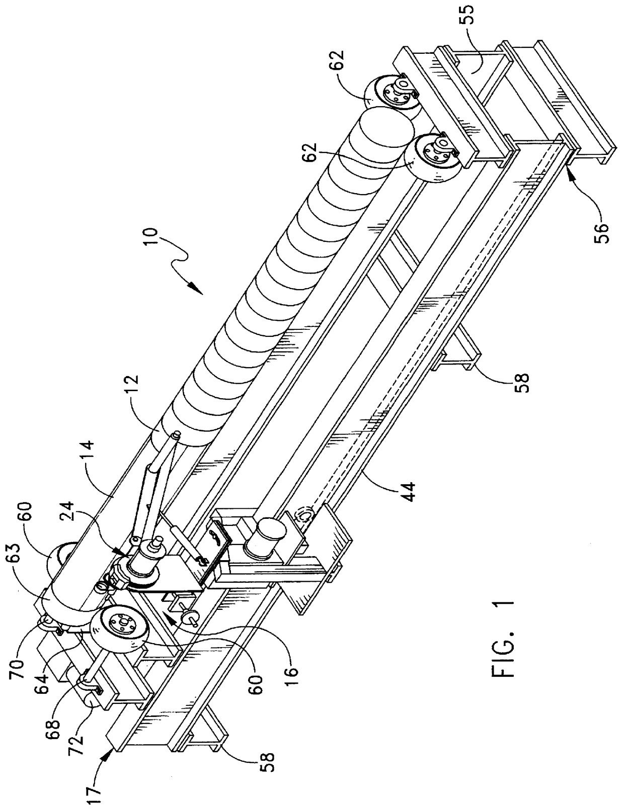 Machine for applying a protective material onto a pipe