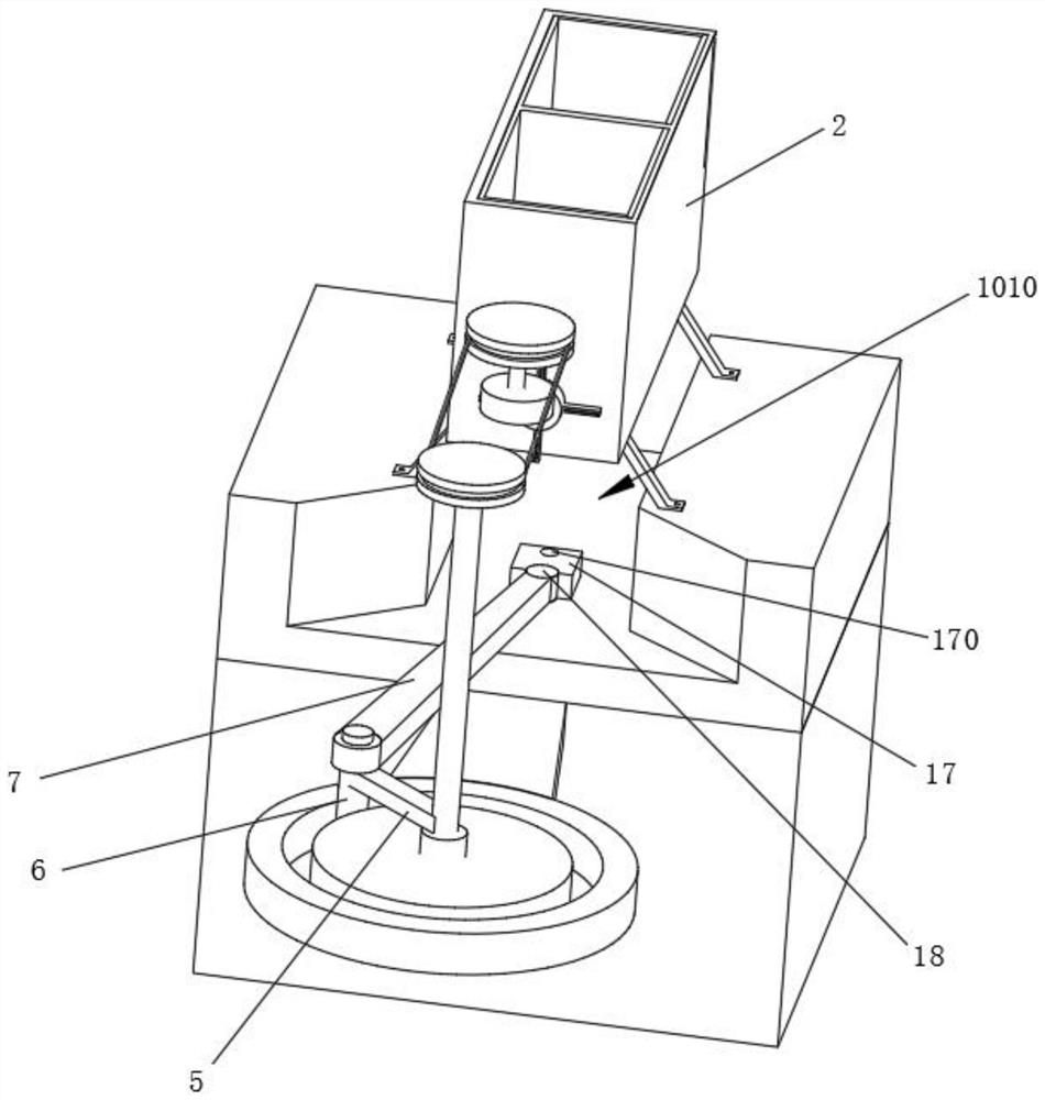 A grinding and cleaning mechanism for axle blocks