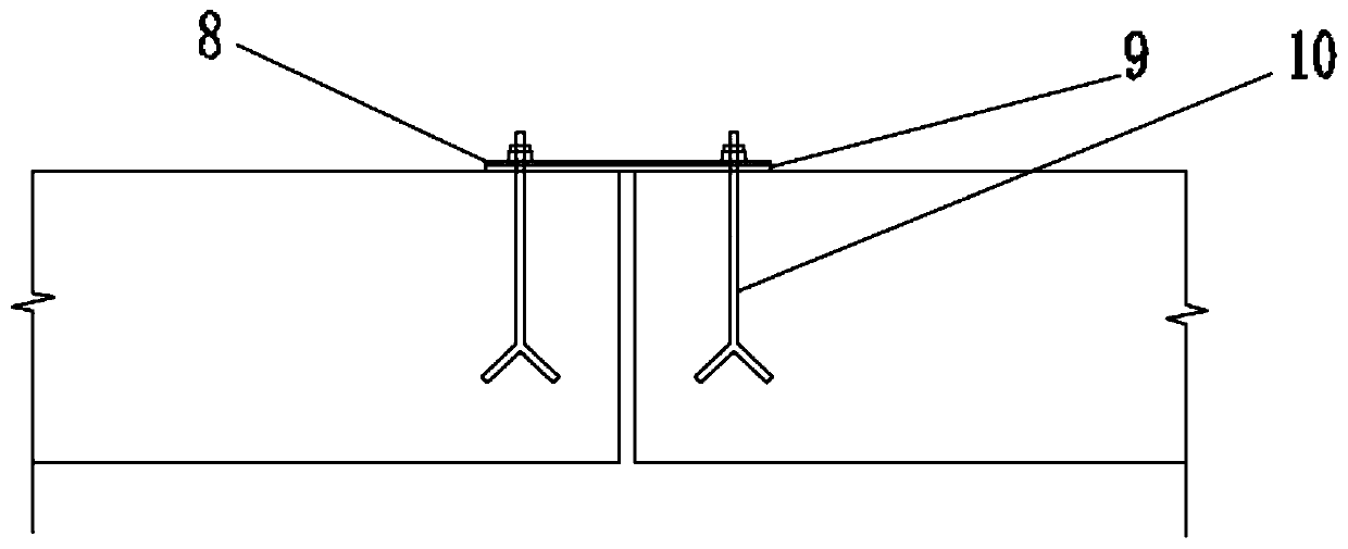 A steel dam gate with a walkway