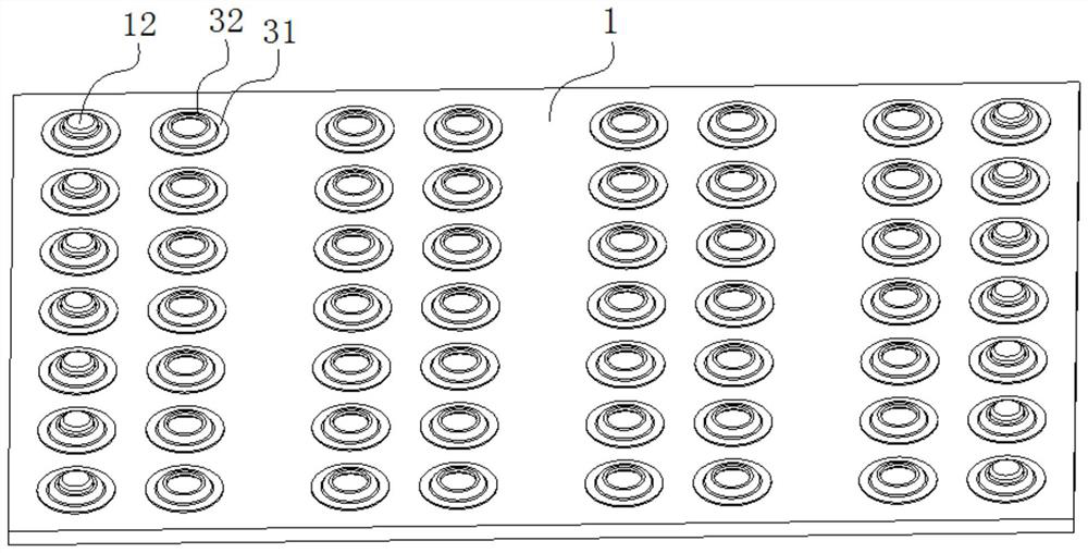 An assembly device for a valve spring base