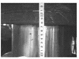 Method for regulating fan-shaped section roller seams of continuous casing machine by using mathematical model