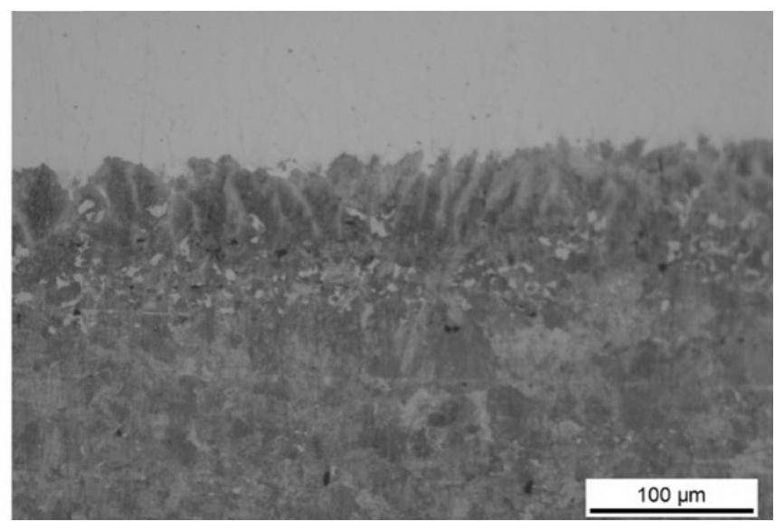 Laser surface strengthening method for improving surface quality and performance of high-carbon steel component