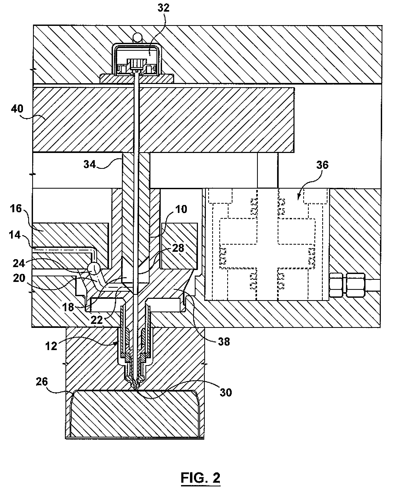 High pressure injection molding nozzle with low pressure manifold