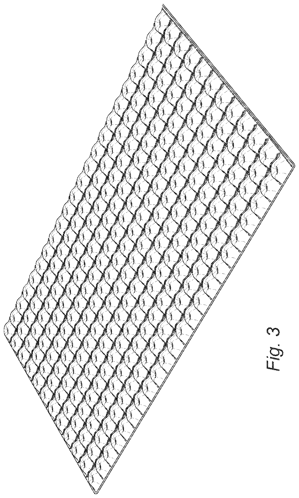 Pocket mattress comprising openings in the casing material