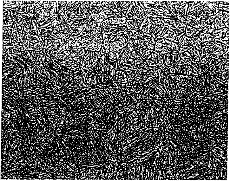 High-flexibility wear-resistant steel plate and manufacturing method thereof