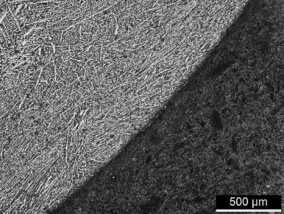 A continuous casting method for eliminating dendrite band segregation near the surface of alloy spring steel wire rod