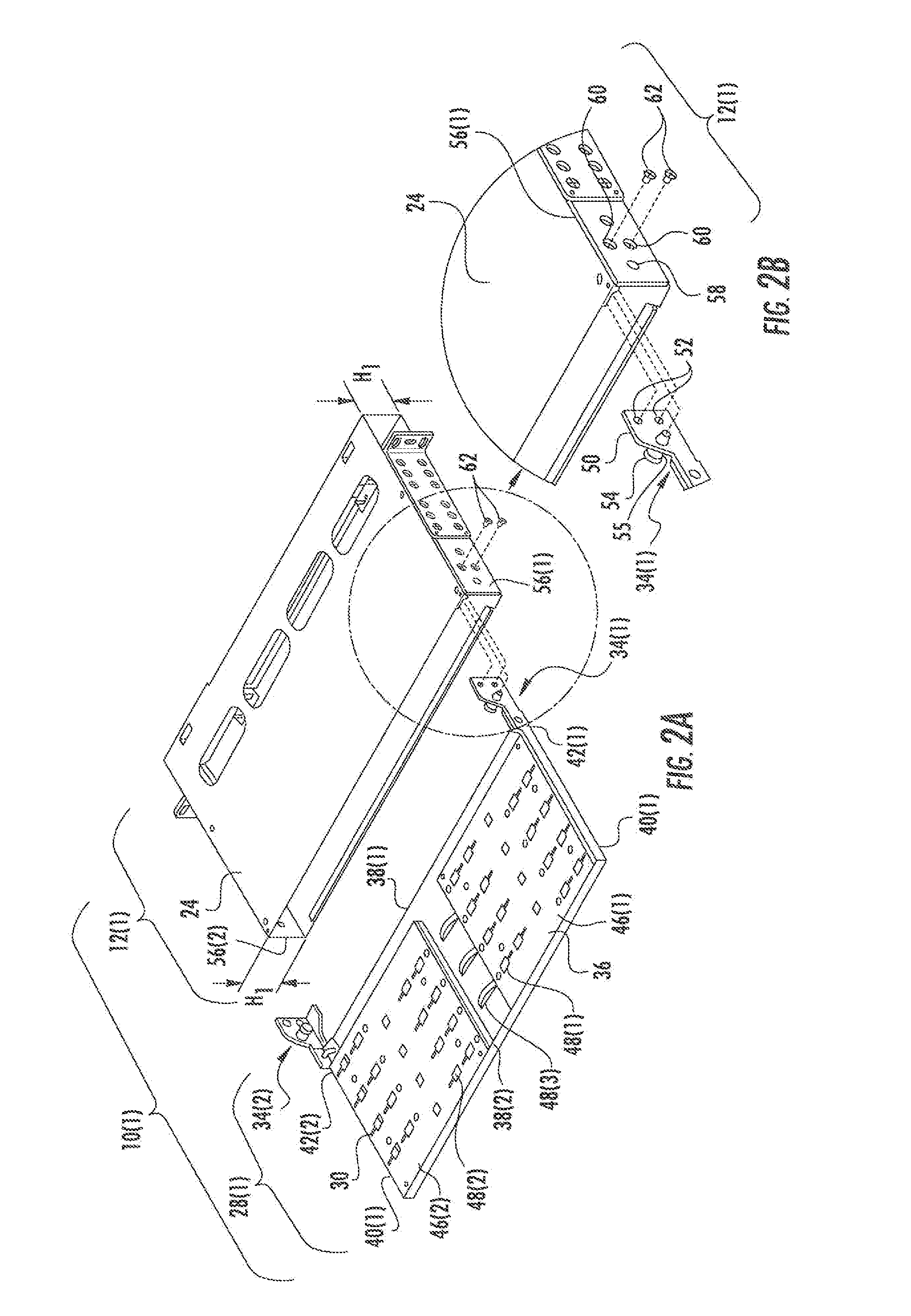 Attachment mechanisms employed to attach a rear housing section to a fiber optic housing, and related assemblies and methods