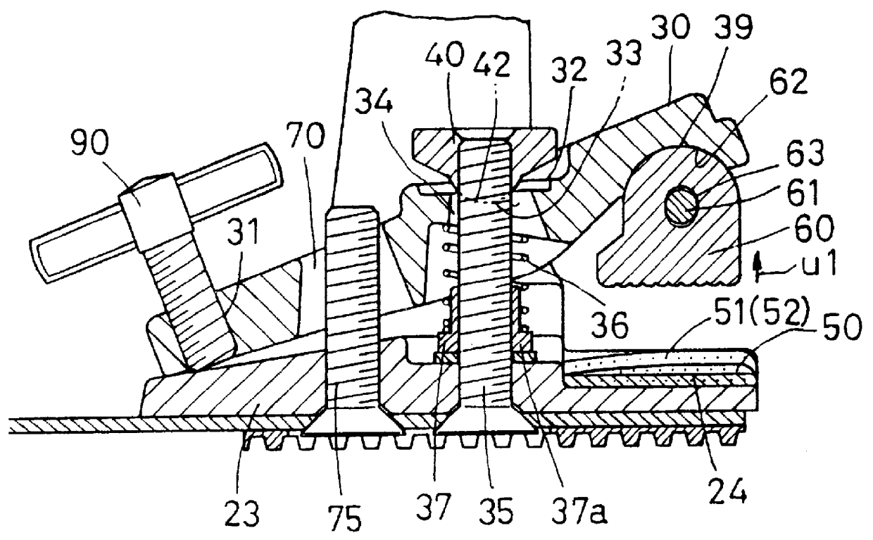 Drum hoop holding device for a drum pedal