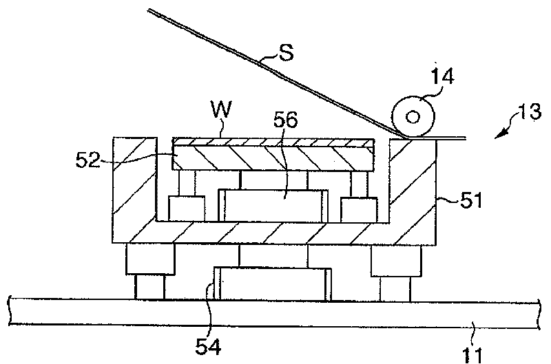 Sheet adhering apparatus and sheet adhering method