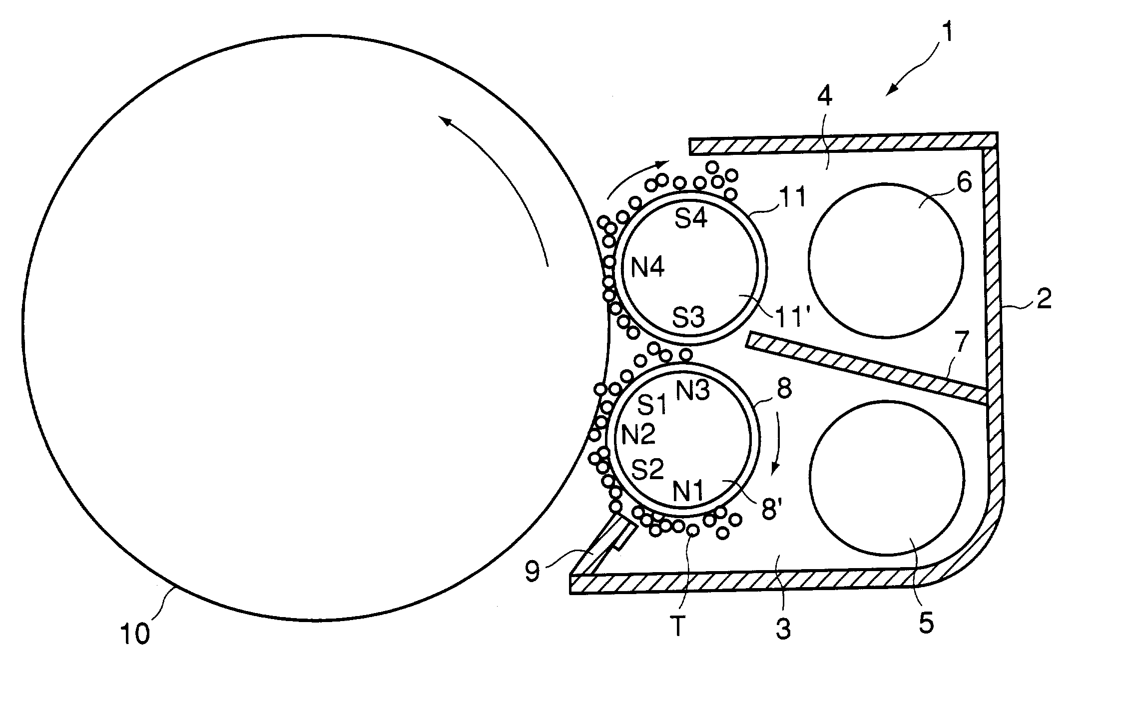 Developing apparatus with two developing chamber-rotatable member pairs