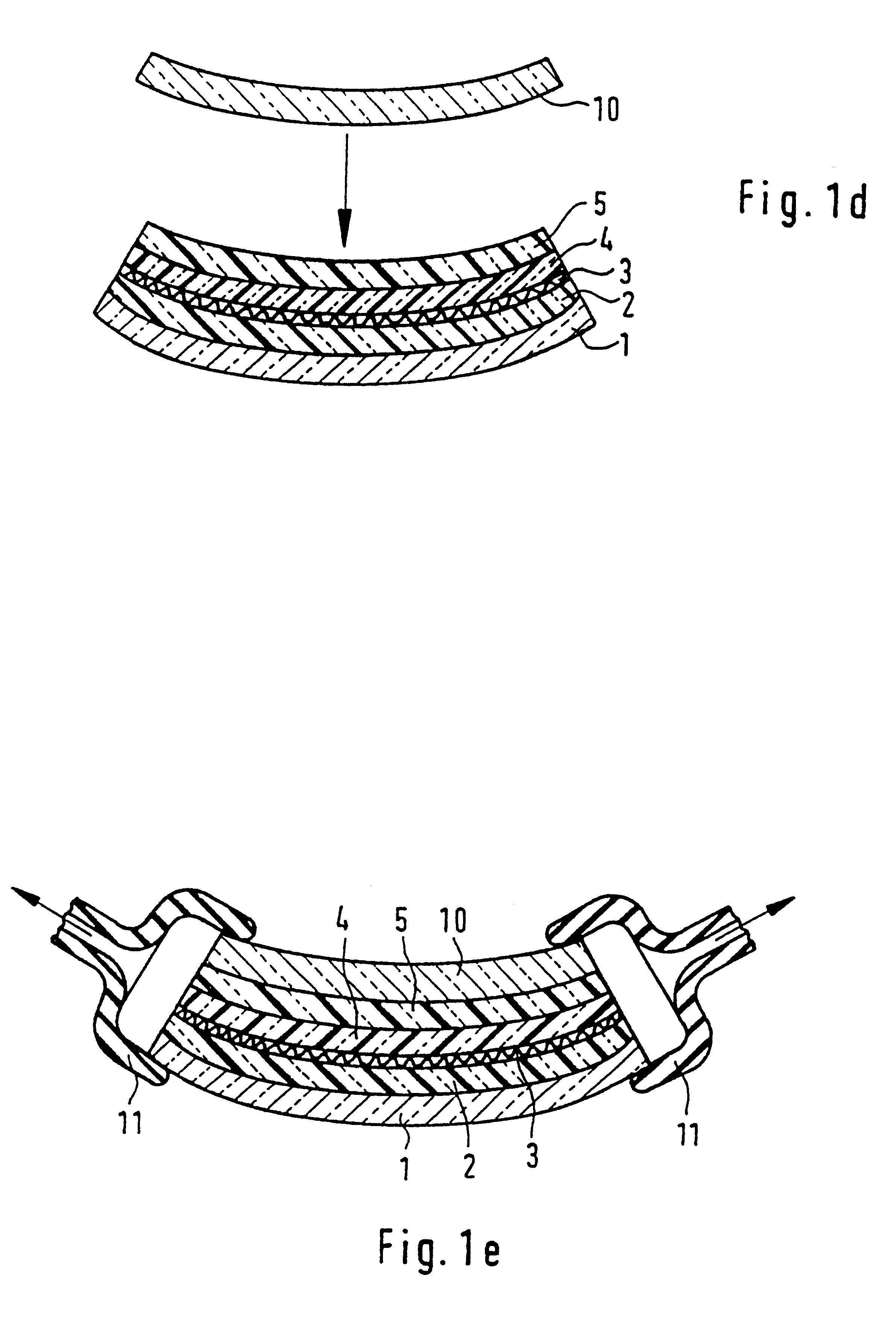 Process for producing a curved laminated safety glass sheet