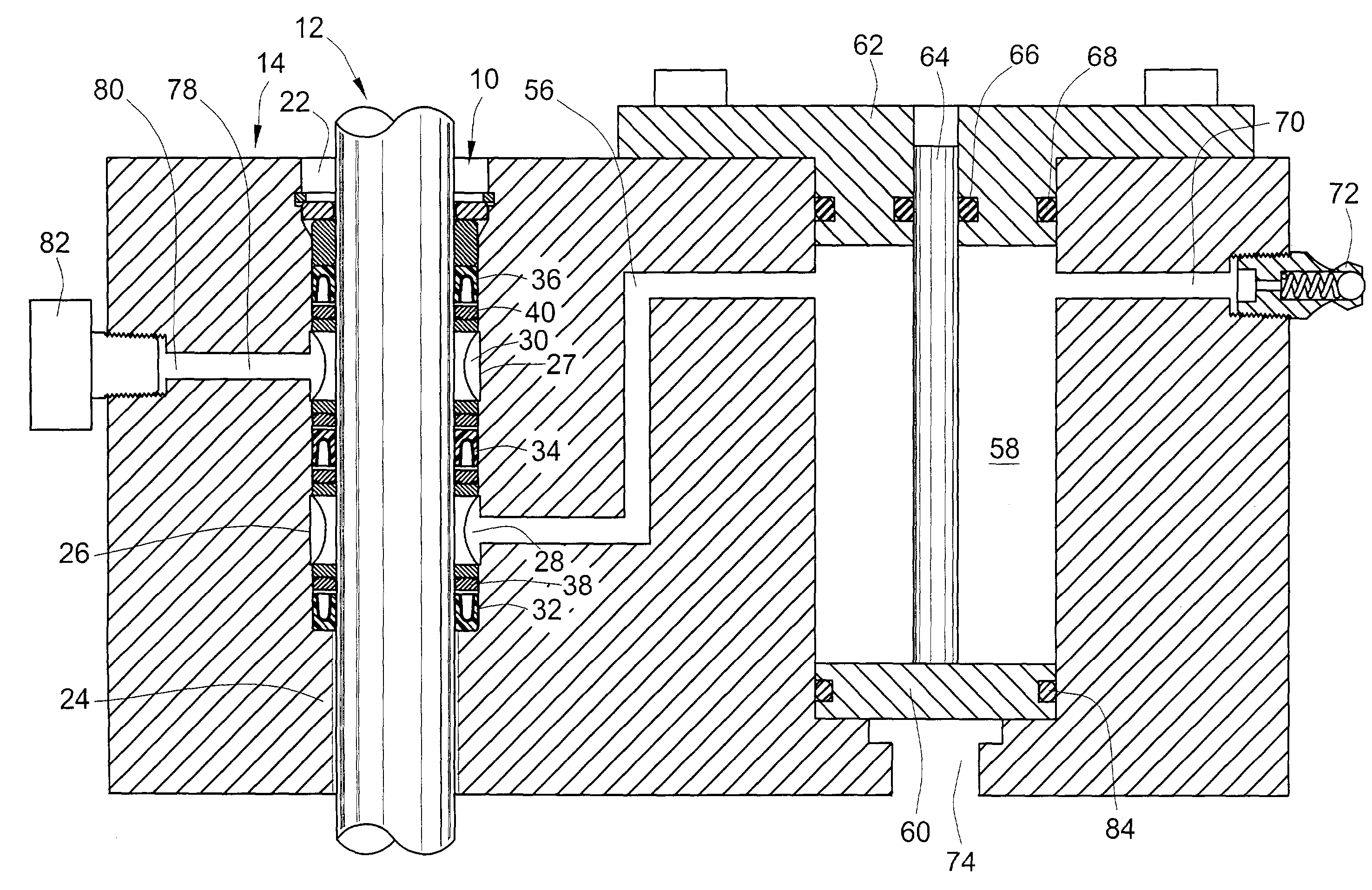 Dynamic sealing arrangement for movable shaft