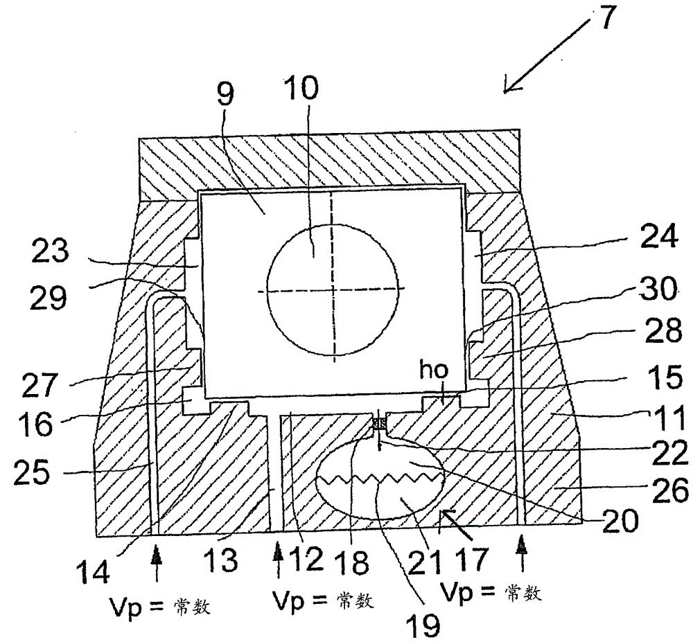 Device and method for winding a web of material