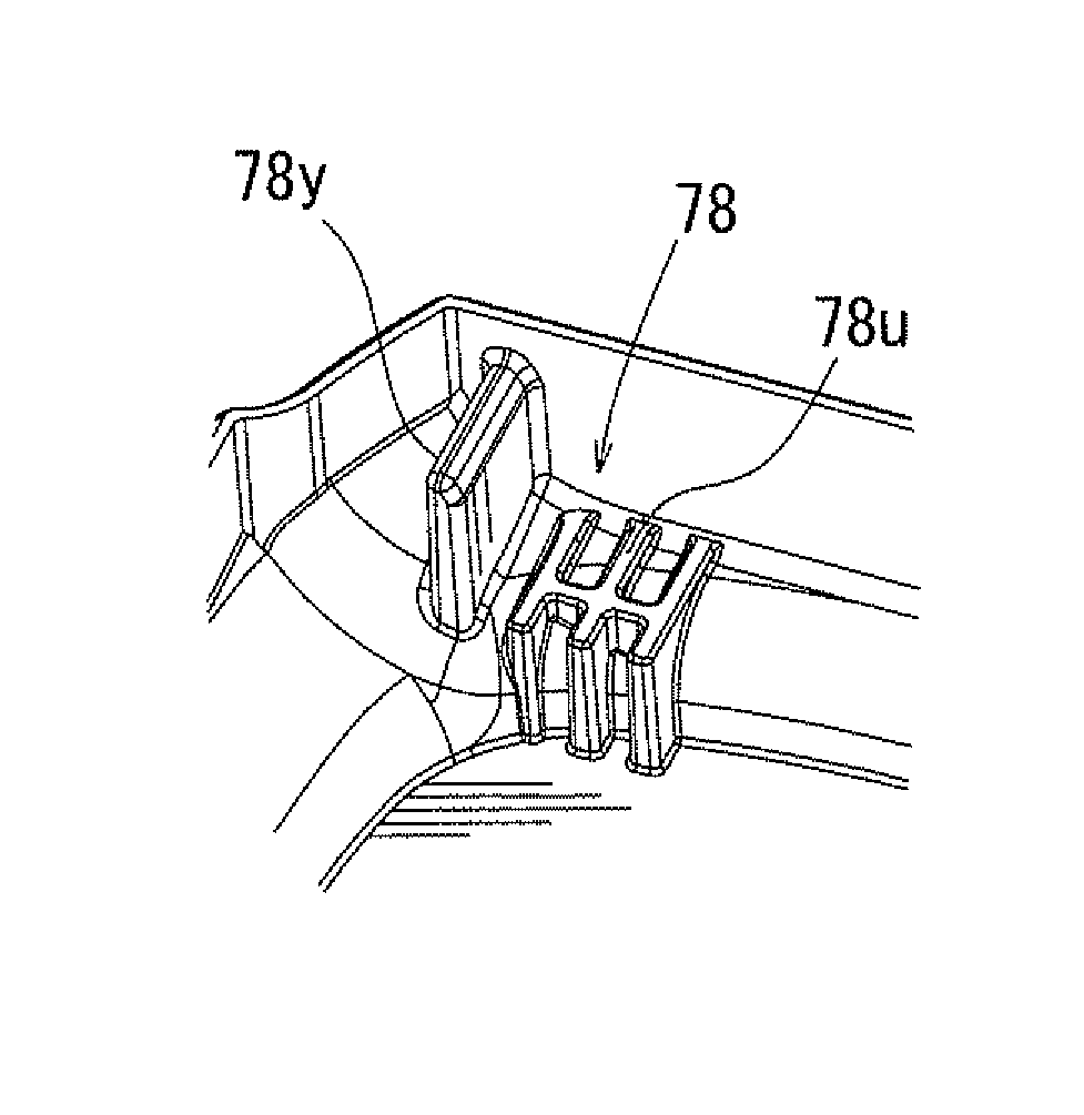 Battery pack including a shock absorbing device