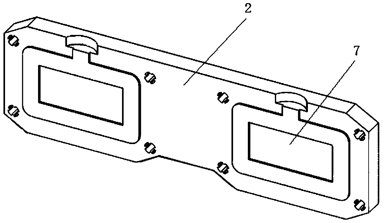 A titanium alloy surfacing gas shield fixed to a welding torch