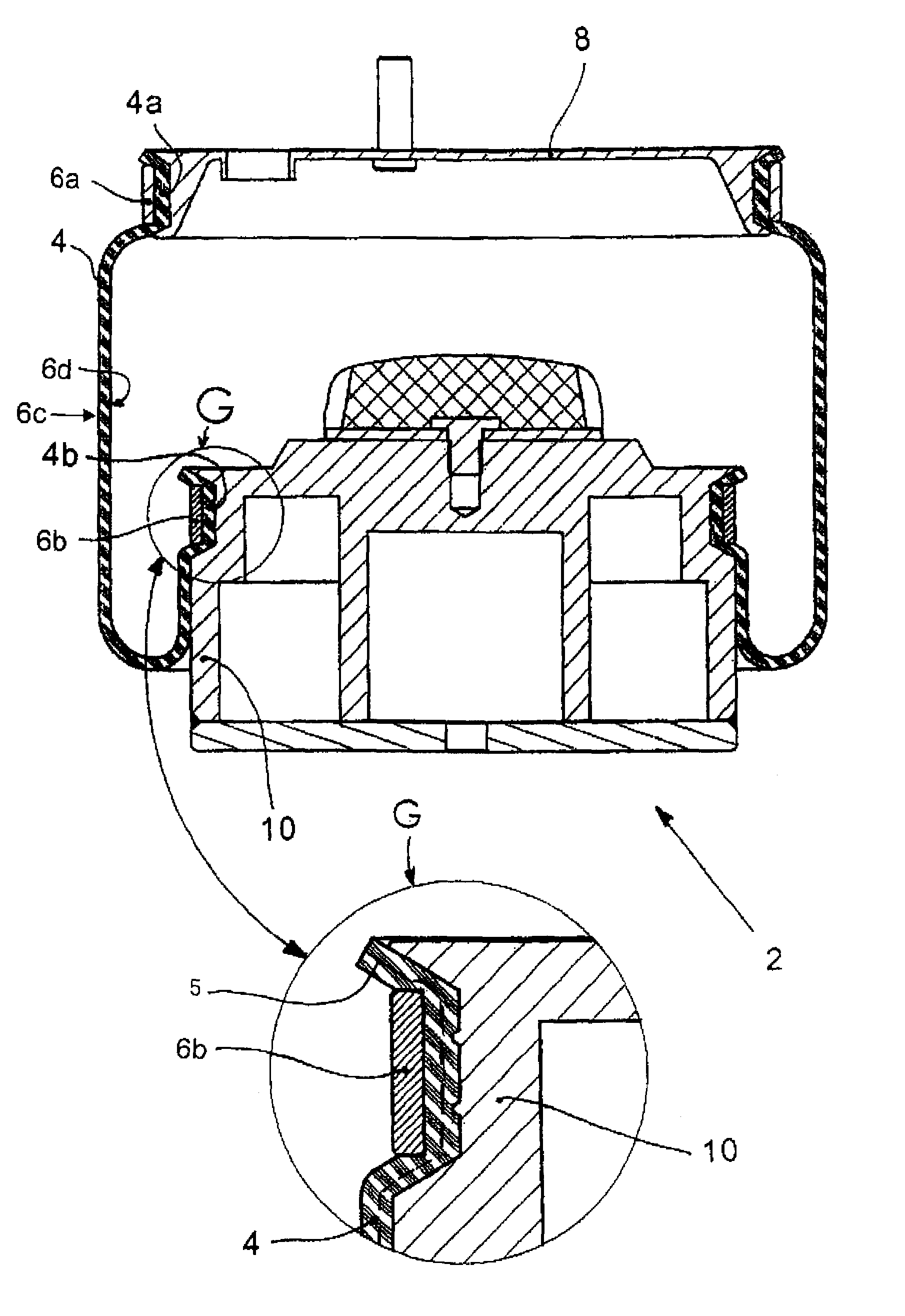 Rolling-lobe air spring having a drop base ring clamp contour