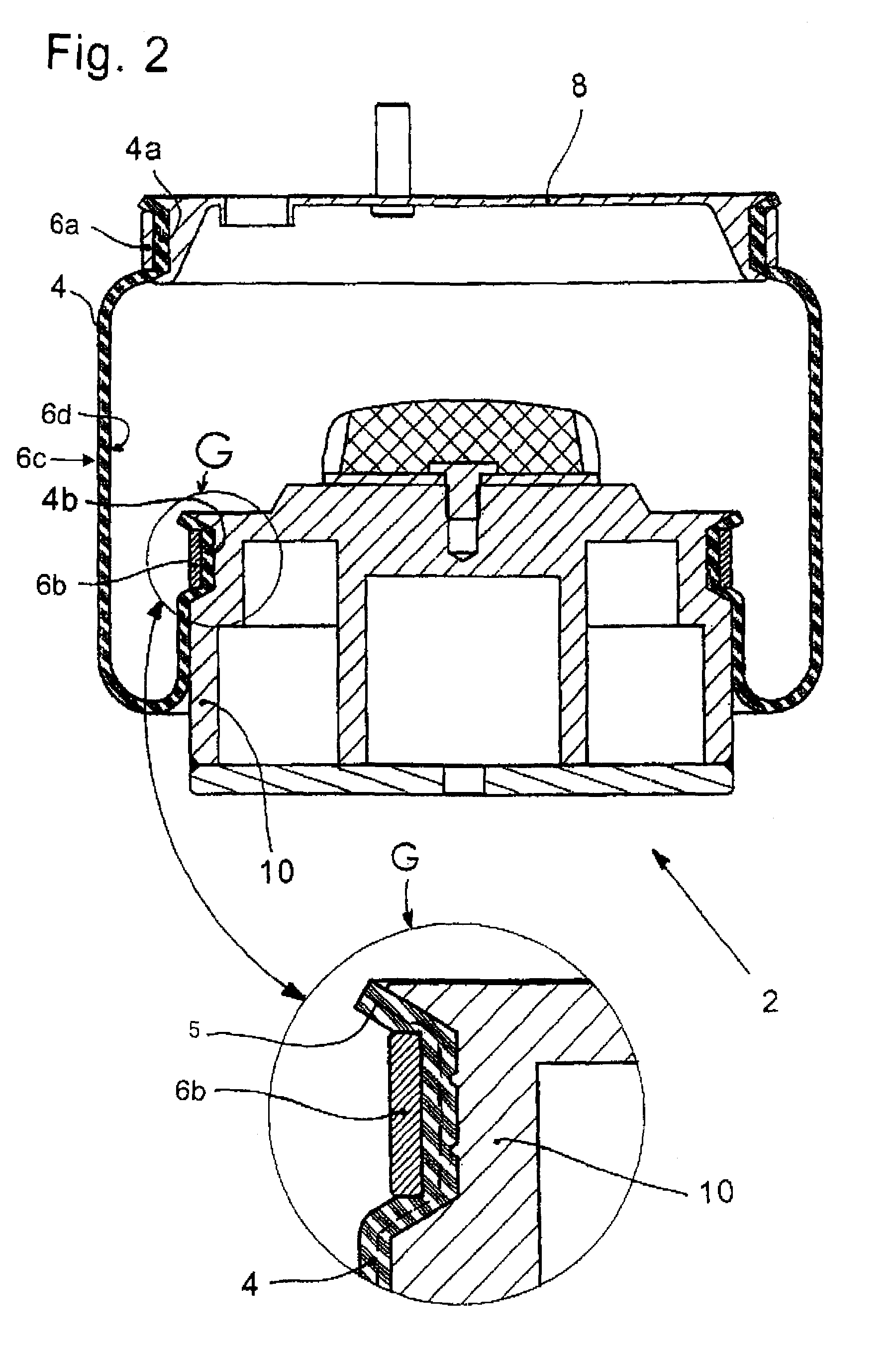 Rolling-lobe air spring having a drop base ring clamp contour