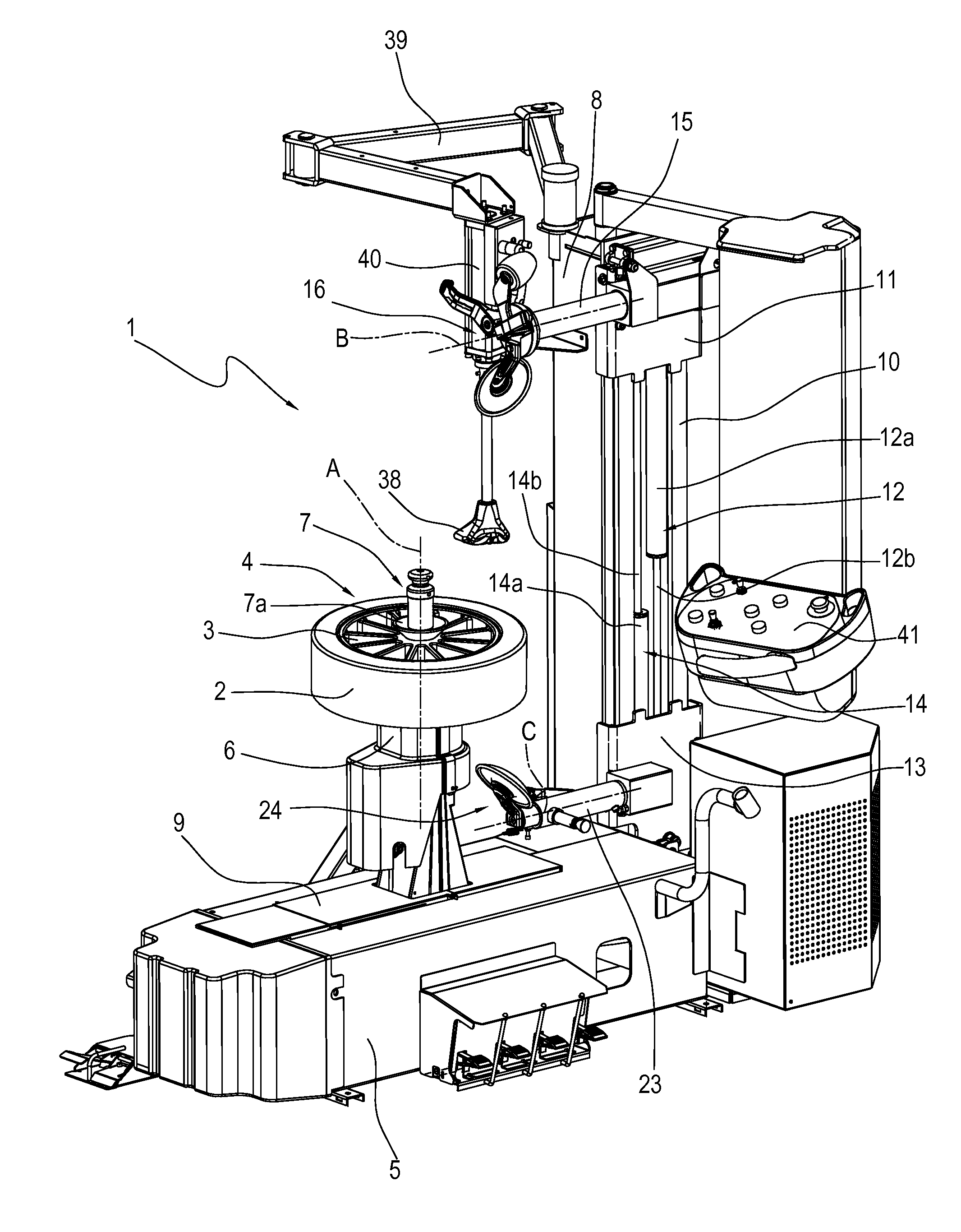 Machine and method for fitting and removing a tyre