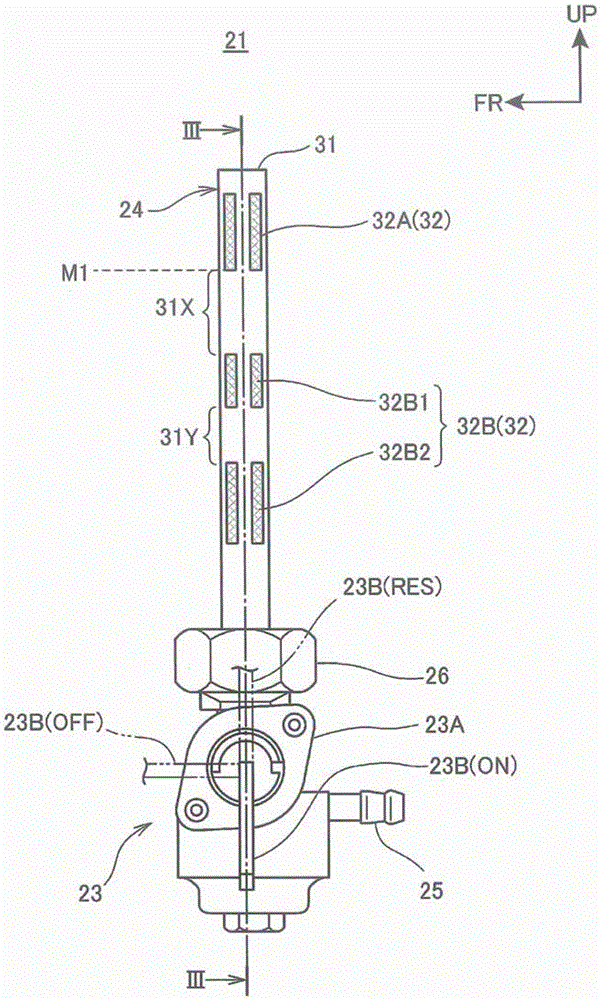 Saddled vehicle and fuel strainer